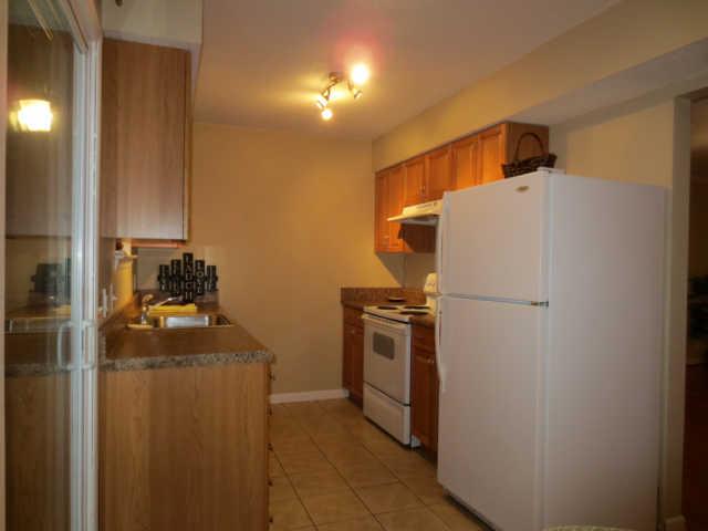 1319 Quail Valley Road Nashville, TN 37214 - Photo 4 of 10 KITCHEN HAS UPDATED CABINETS, COUNTERS, TILE FLOORS STOVE, DISHWASHER