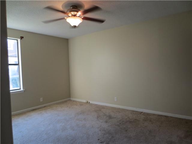 1319 Quail Valley Road Nashville, TN 37214 - Photo 10 of 10 The master bedroom is on main level, w WICLO , full bath w/ tub shower combo. Tiled showere walls.
