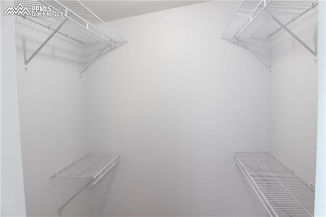22425 Spencer Road Calhan, CO 80808 - Photo 16 of 27 Master bedroom has large walk in closet