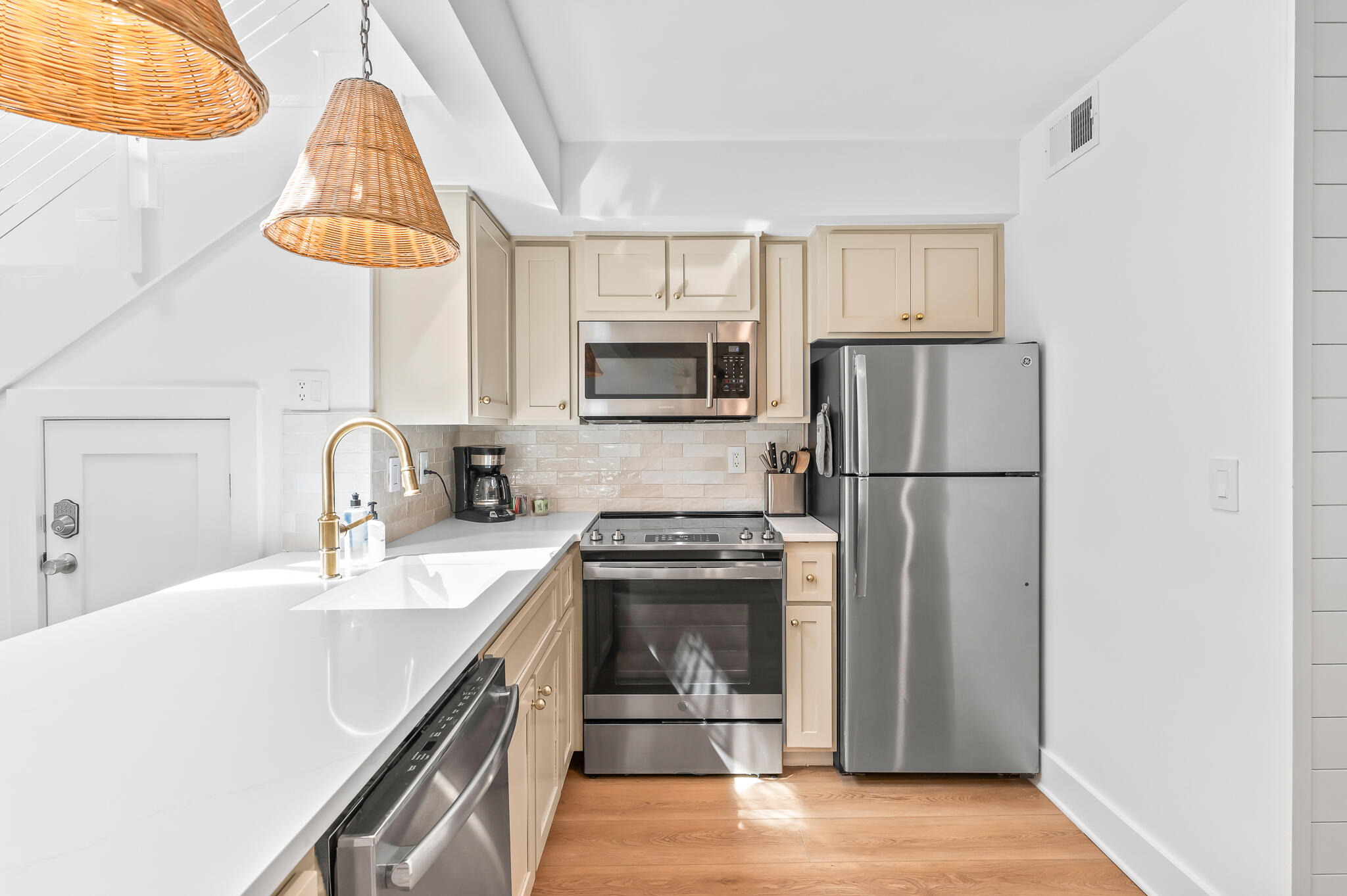 70 North Camp Creek Rd Inlet Beach, Unit 3 Inlet Beach, FL 32461 - Photo 26 of 66 a kitchen with a sink a refrigerator and a stove