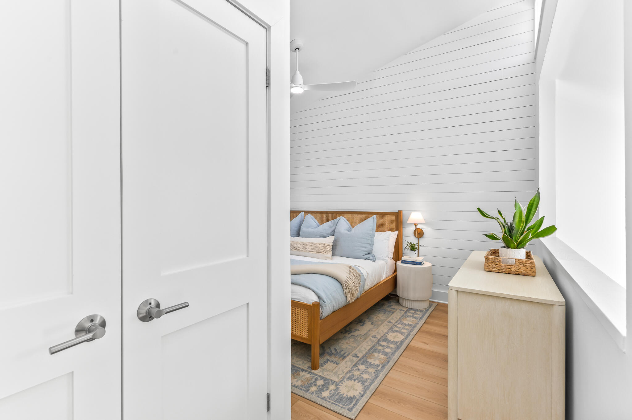 70 North Camp Creek Rd Inlet Beach, Unit 3 Inlet Beach, FL 32461 - Photo 31 of 66 a bedroom with a bed and a potted plant