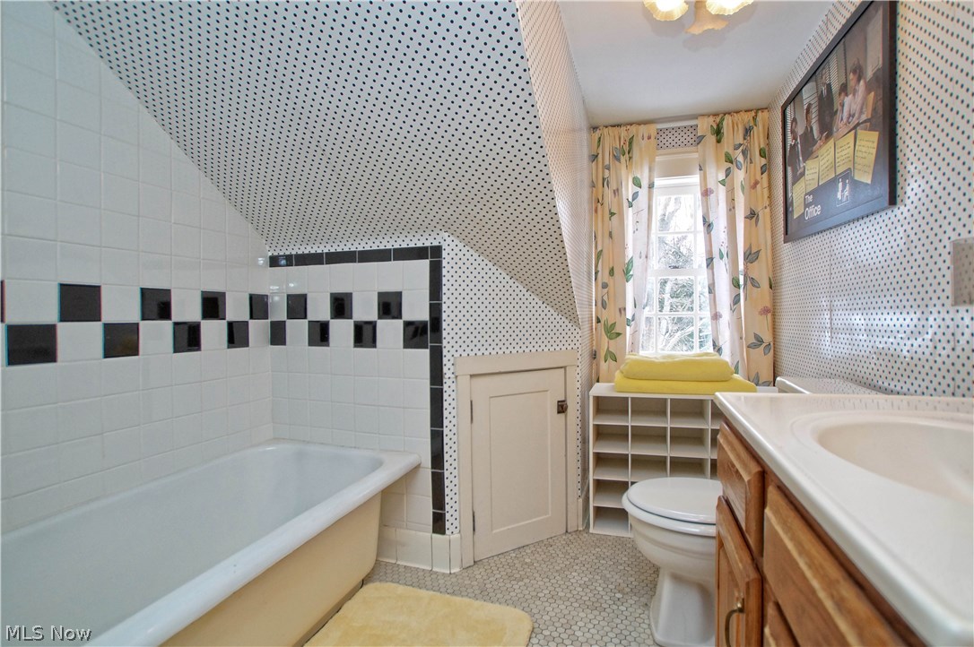 1719 Sheridan Road Cleveland, OH 44121 - Photo 27 of 35 Third floor bath with wonderful black and white tile and updated vanity.