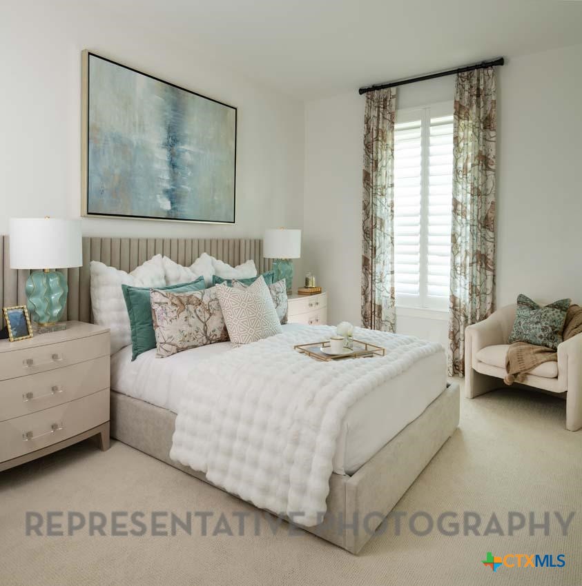 5727 Ryder Road New Braunfels, TX 78130 - Photo 14 of 18 a bedroom with a bed and window