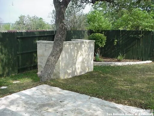 a view of backyard with green space