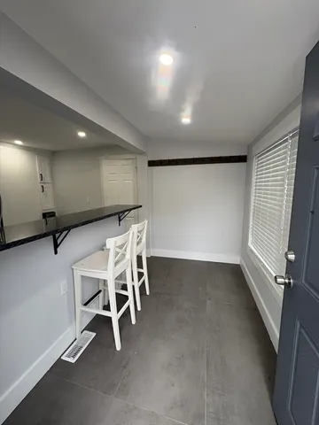 a view of a room with chairs