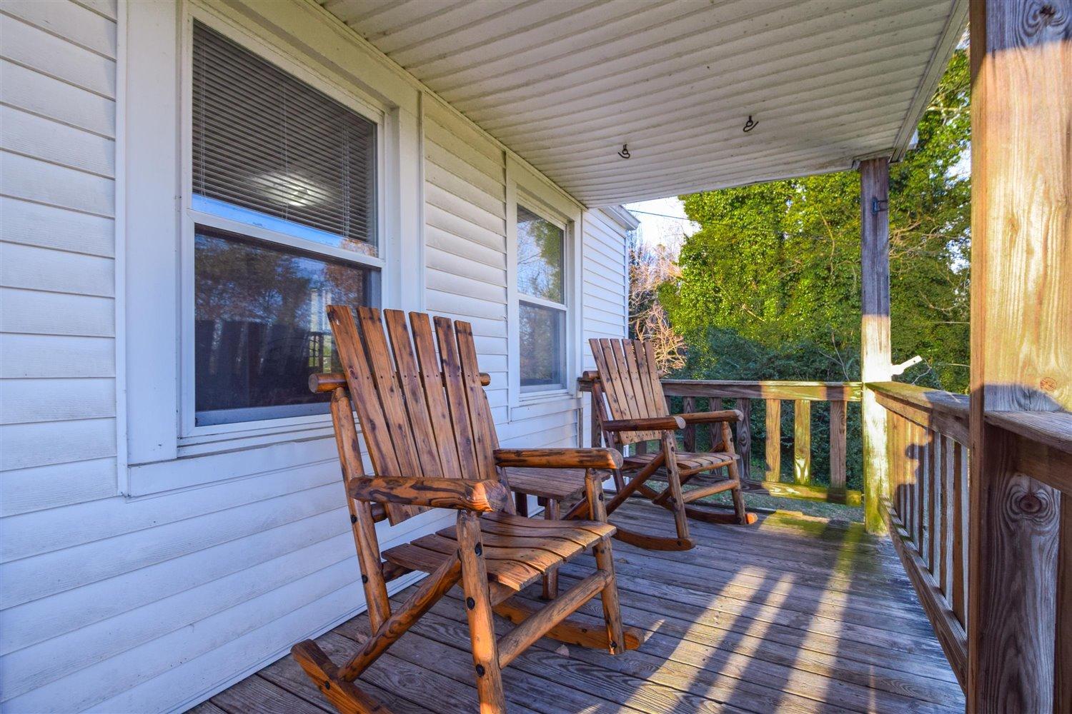 6306 Roberta Road Roanoke, VA 24019 - Photo 2 of 27 a view of balcony with chairs and wooden fence
