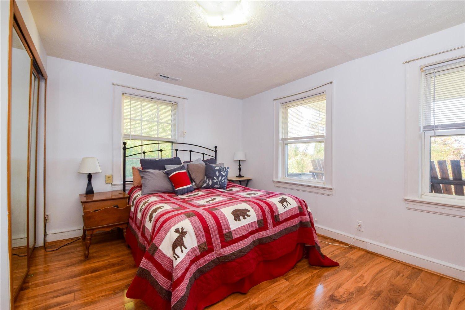 6306 Roberta Road Roanoke, VA 24019 - Photo 14 of 27 a bedroom with a bed and a window