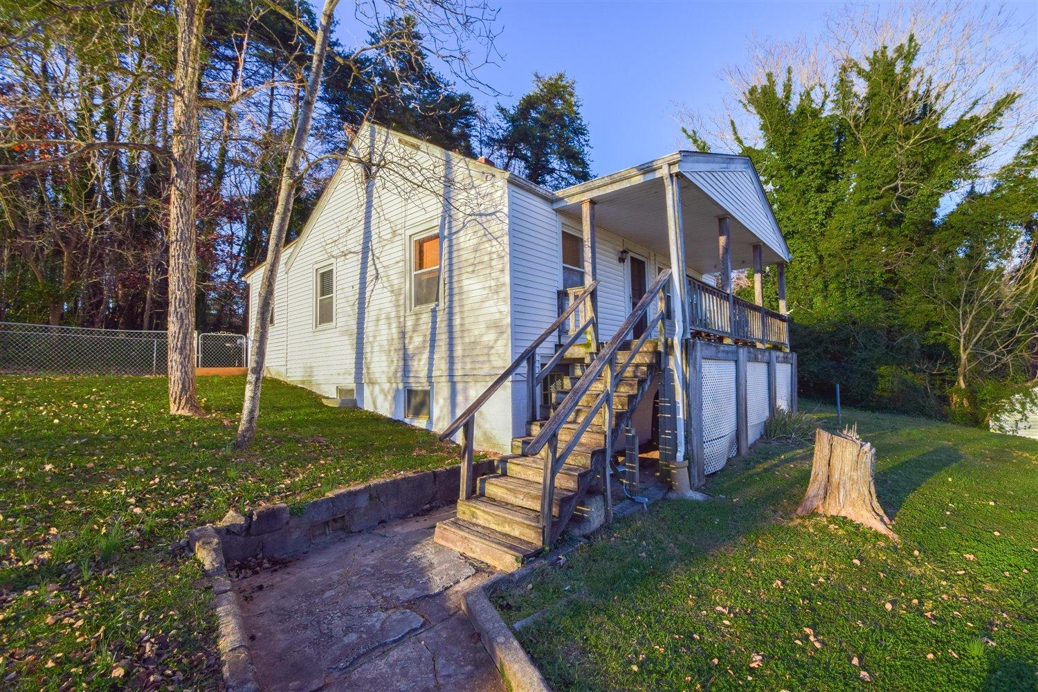 6306 Roberta Road Roanoke, VA 24019 - Photo 21 of 27 a view of a house with a yard