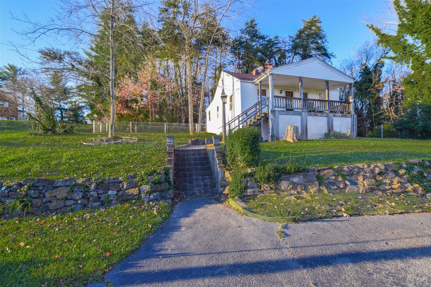 6306 Roberta Road Roanoke, VA 24019 - Photo 22 of 27 a front view of a house with a yard