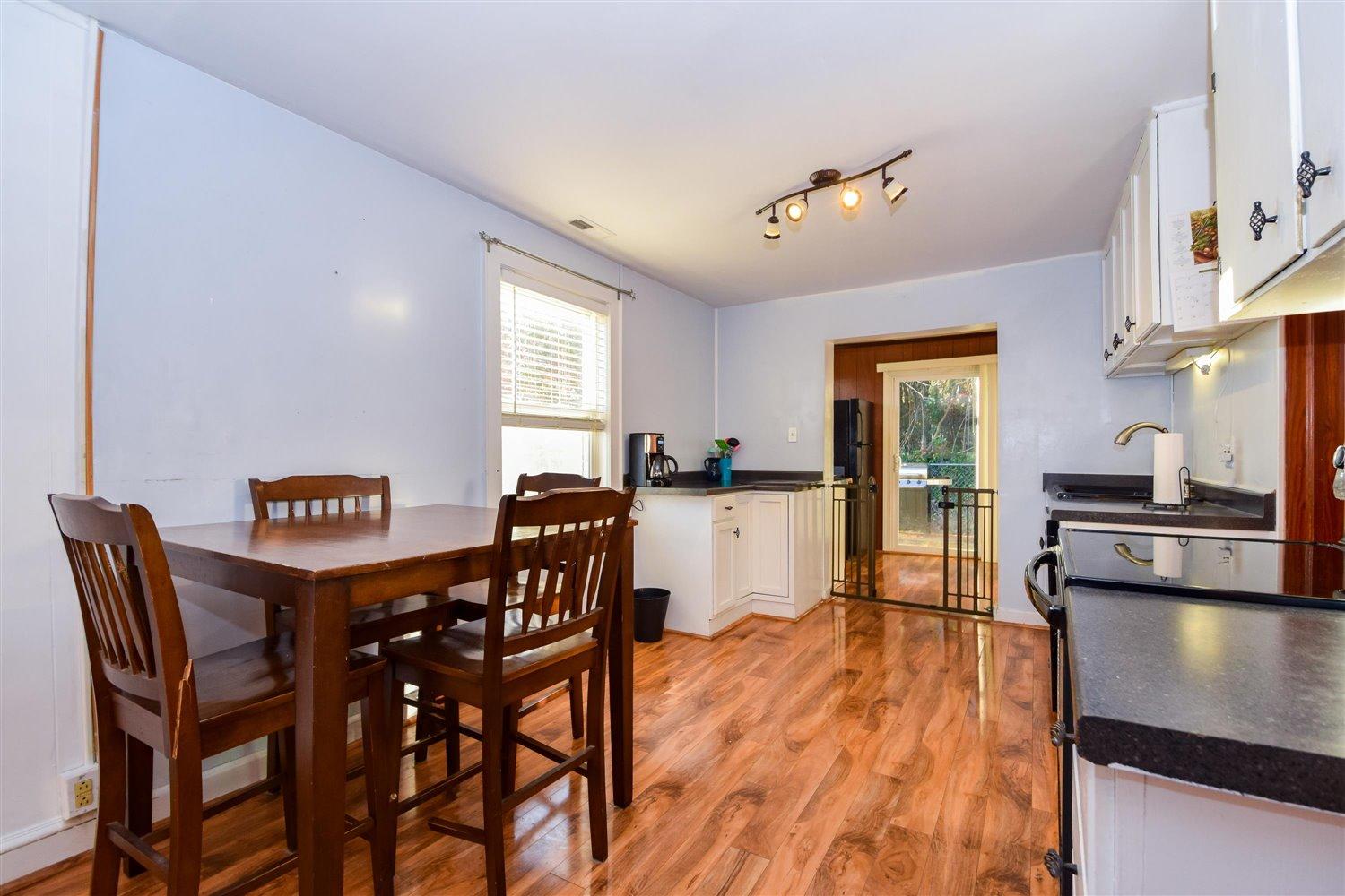 6306 Roberta Road Roanoke, VA 24019 - Photo 9 of 27 a view of a dining room with furniture and wooden floor