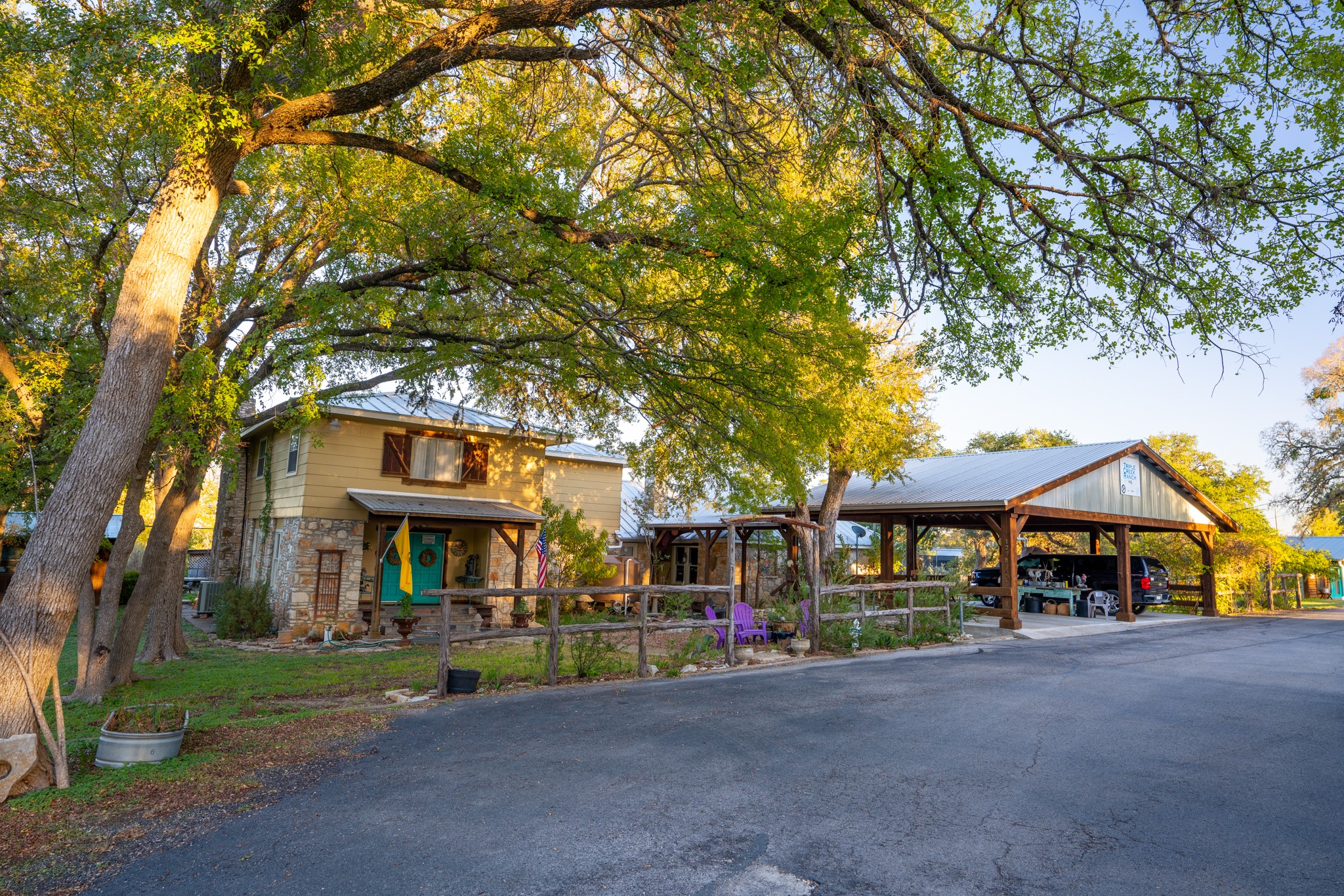 12737 Silver Creek Road Dripping Springs, TX 78620 - Photo 1 of 36 a front view of a building with street view