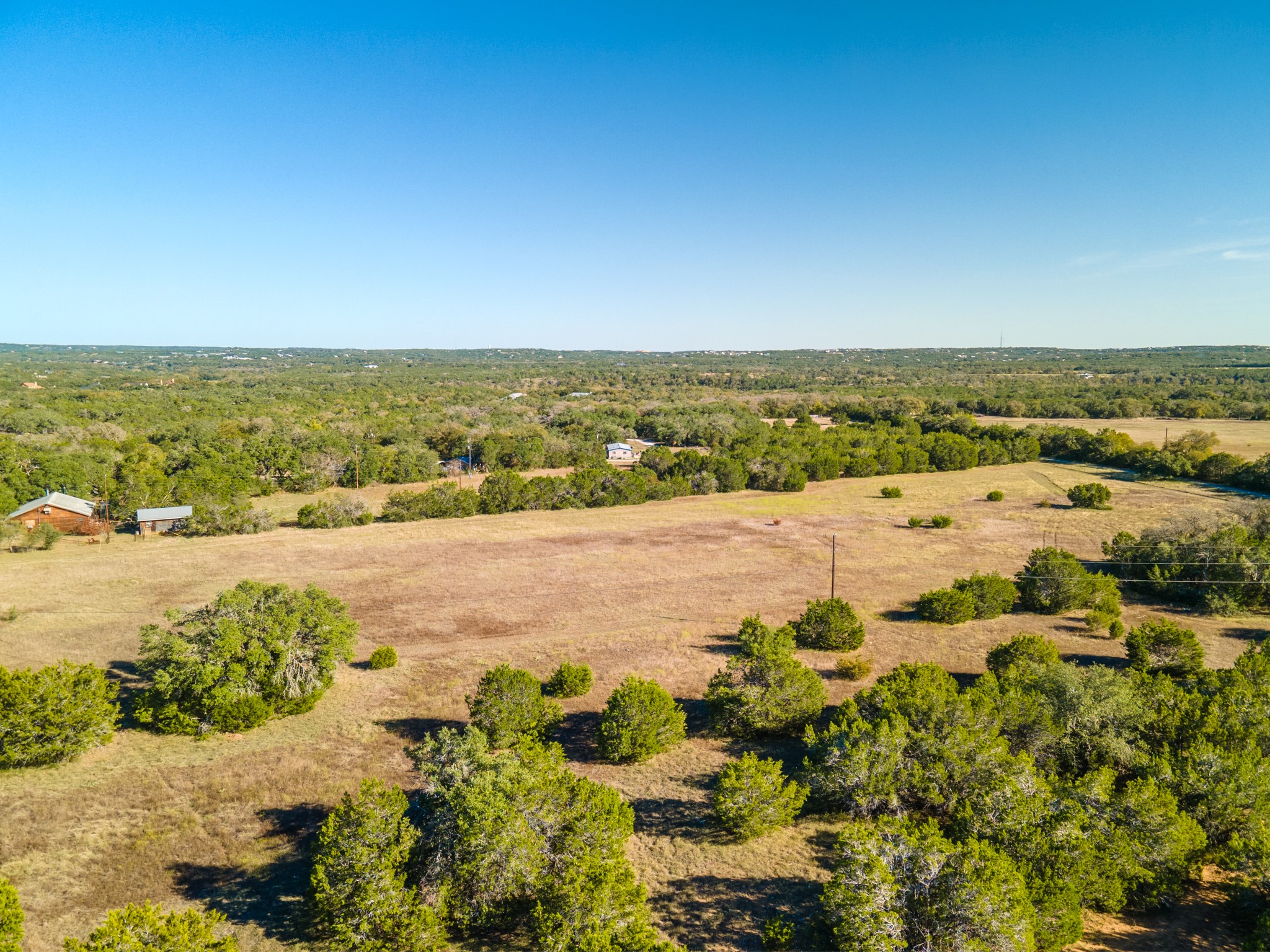 12737 Silver Creek Road Dripping Springs, TX 78620 - Photo 11 of 36 a view of an ocean with city