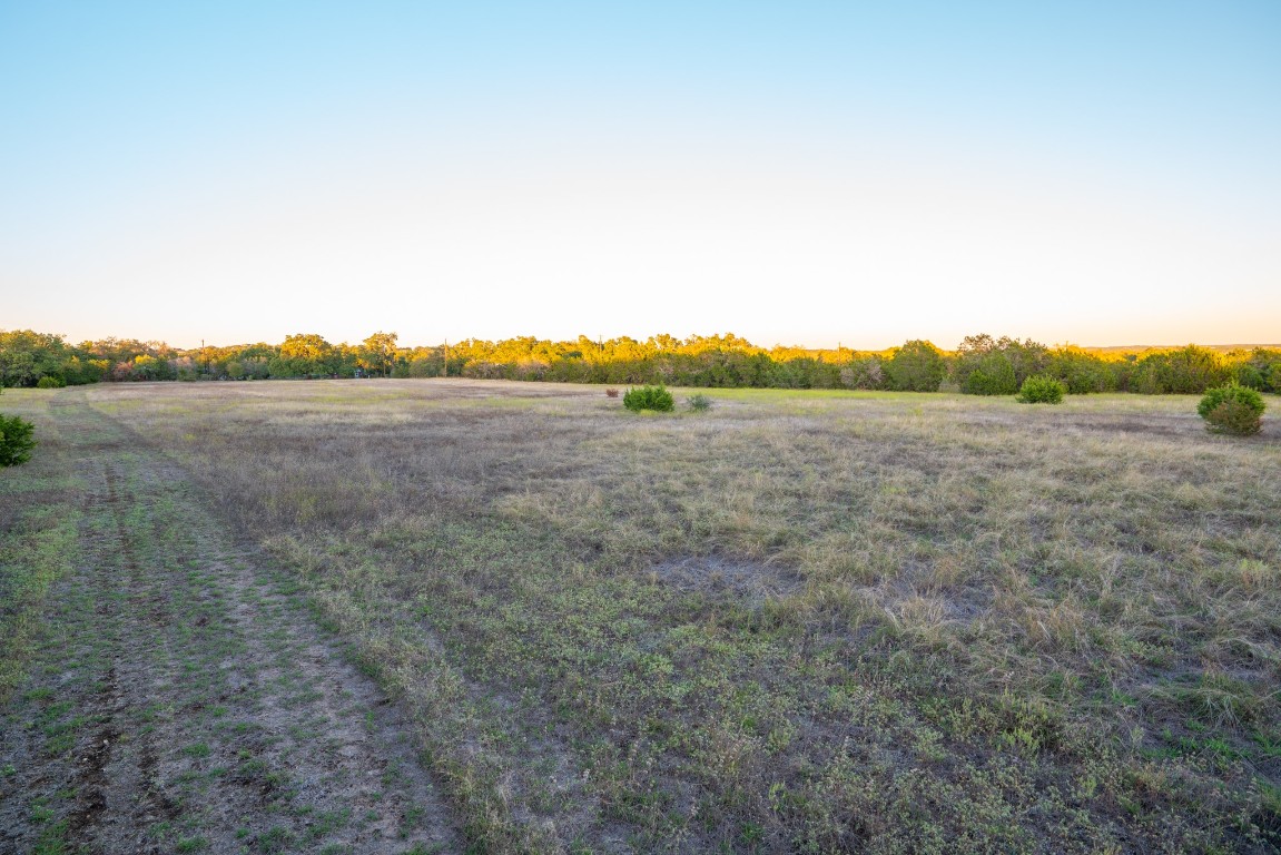 12737 Silver Creek Road Dripping Springs, TX 78620 - Photo 27 of 36 a view of an outdoor space and a lake view