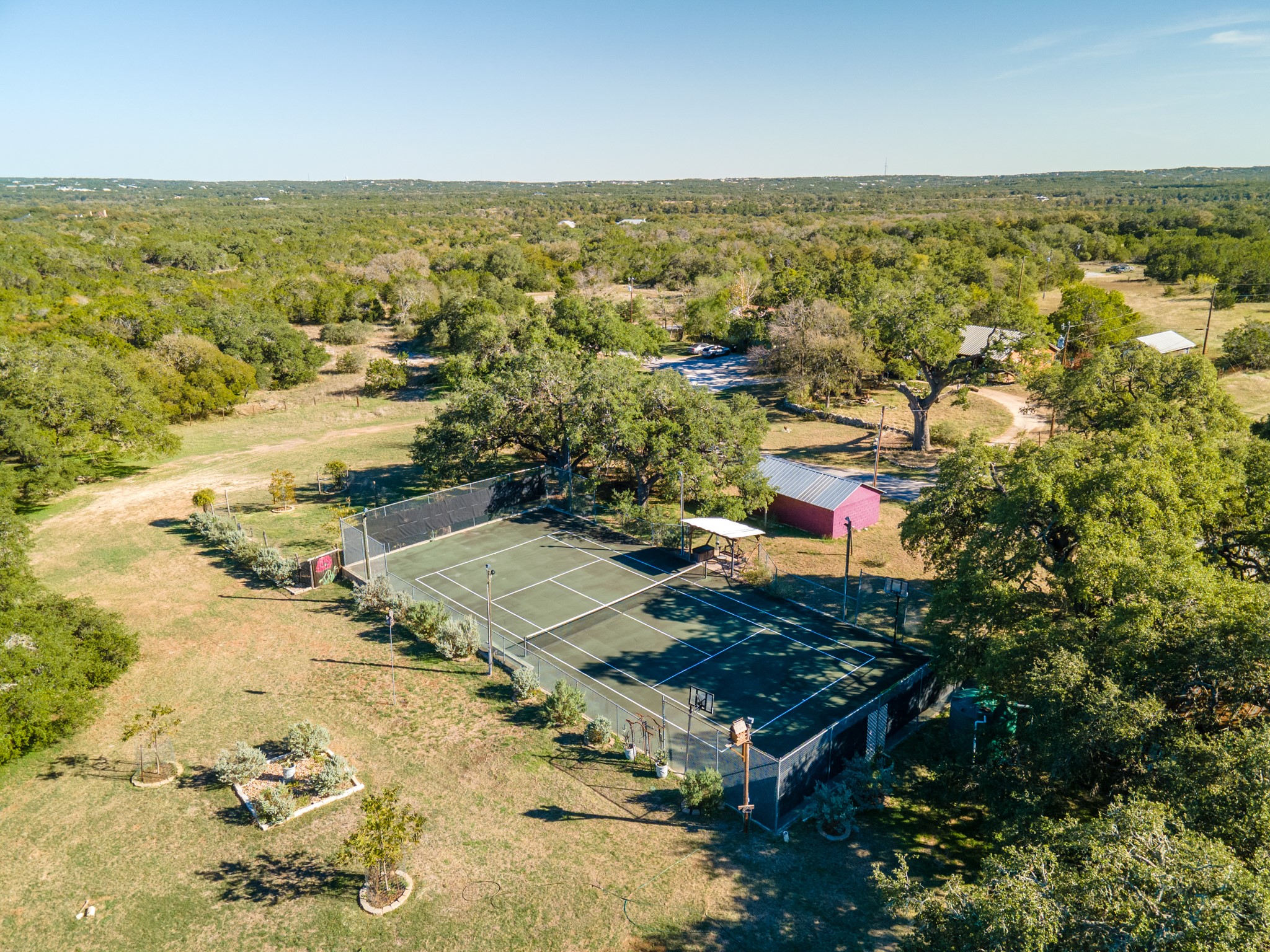 12737 Silver Creek Road Dripping Springs, TX 78620 - Photo 5 of 36 view of city and ocean