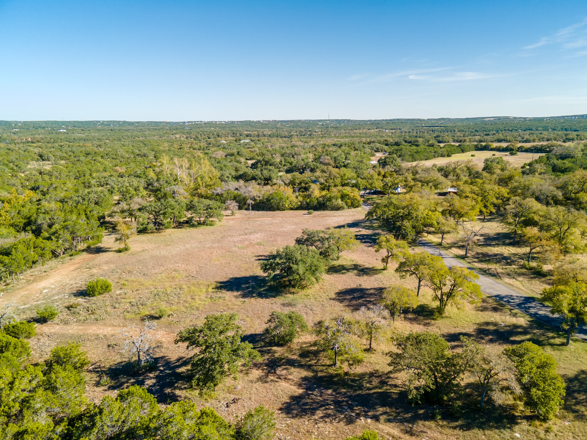12737 Silver Creek Road Dripping Springs, TX 78620 - Photo 10 of 36 a view of lake view and mountain