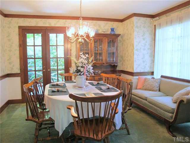 1412 Dellwood Drive Raleigh, NC 27607 - Photo 7 of 22 Formal Dining Room Opens to Deck