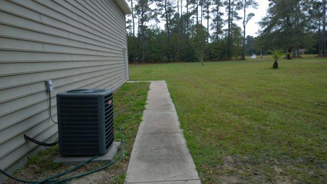 5990 County Line Road Ravenel, SC 29470 - Photo 13 of 24 5990 county line rd walkway to garage