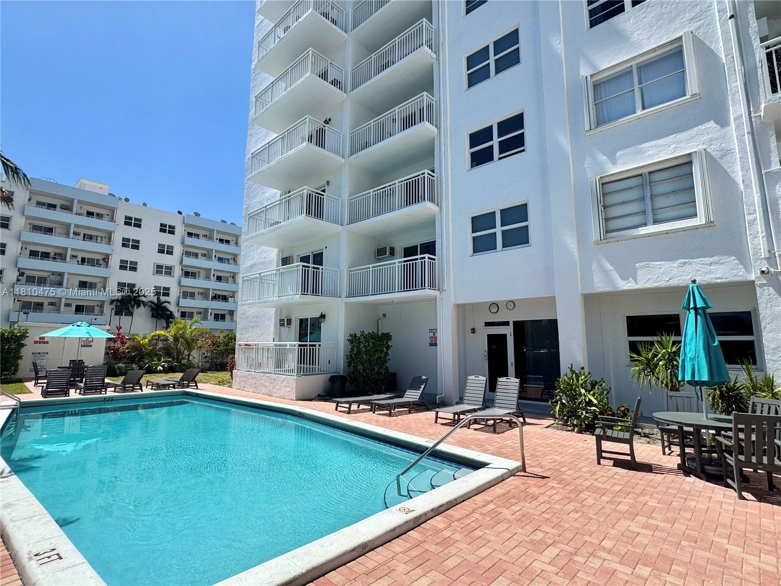 200 South Birch Road, Unit 304 Fort Lauderdale, FL 33316 - Photo 10 of 16 a view of swimming pool with outdoor seating