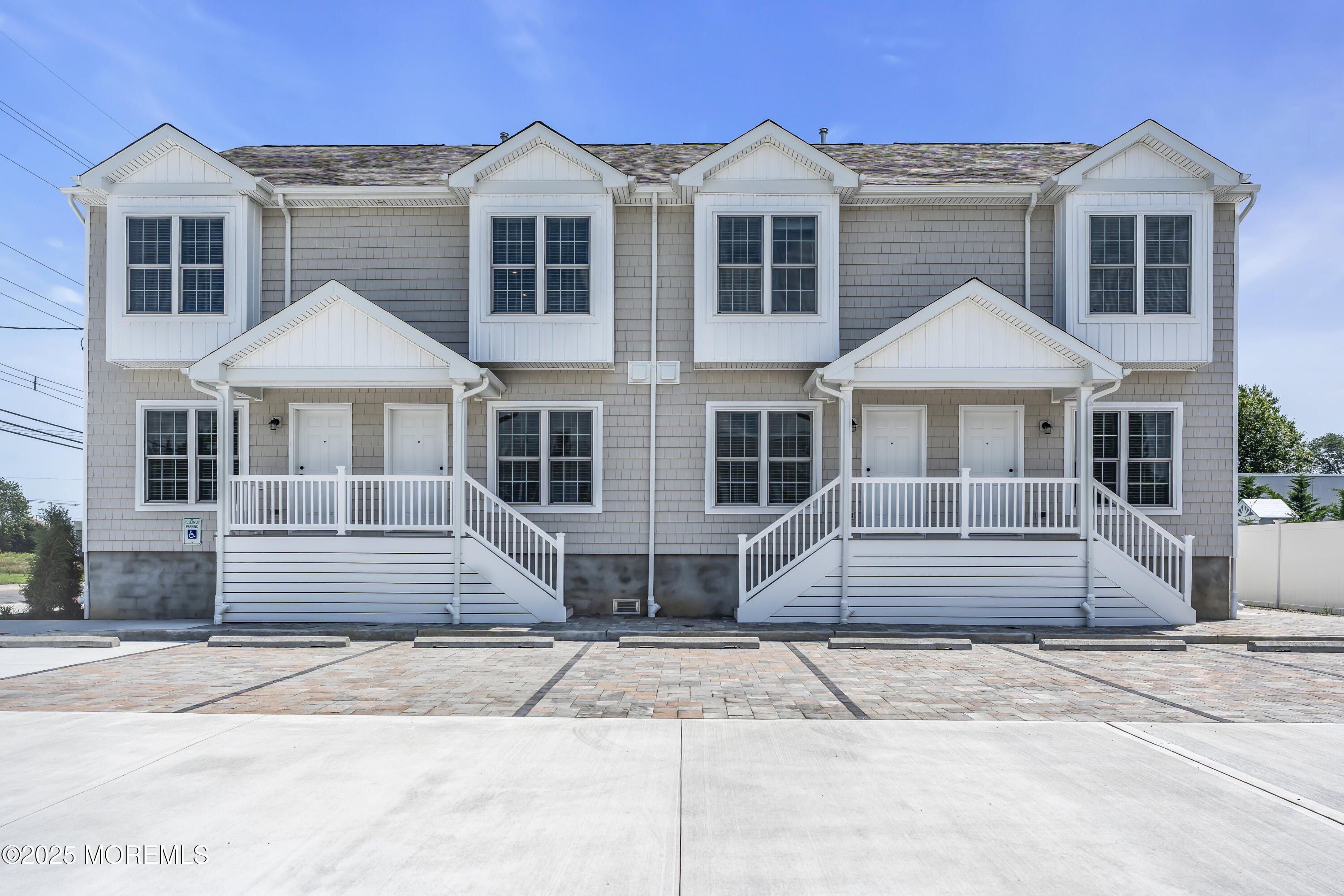 604 Ocean Road Point Pleasant, NJ 08742 - Photo 1 of 15 a front view of a house with a yard