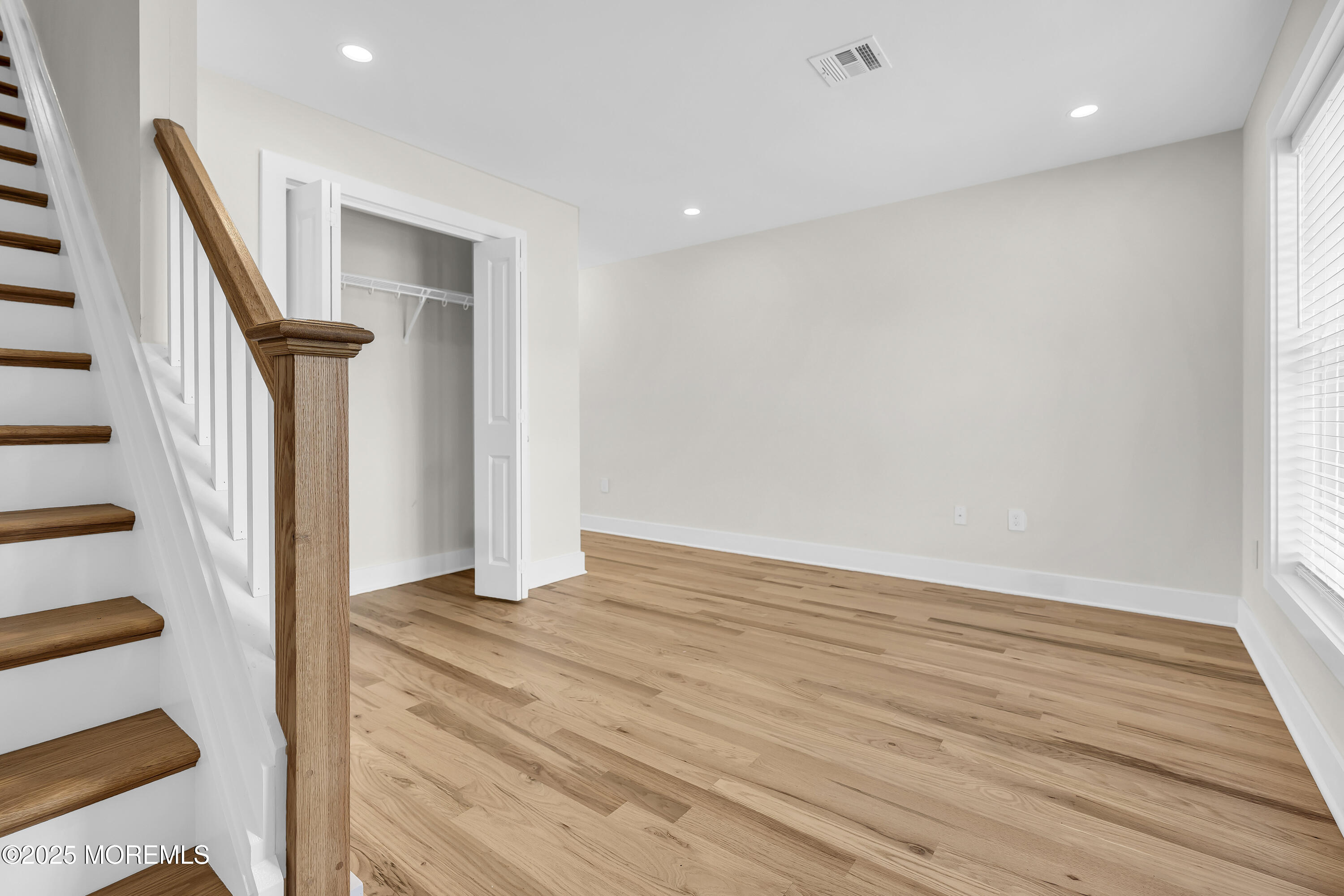 604 Ocean Road Point Pleasant, NJ 08742 - Photo 3 of 15 a view of an entryway with wooden floor and door