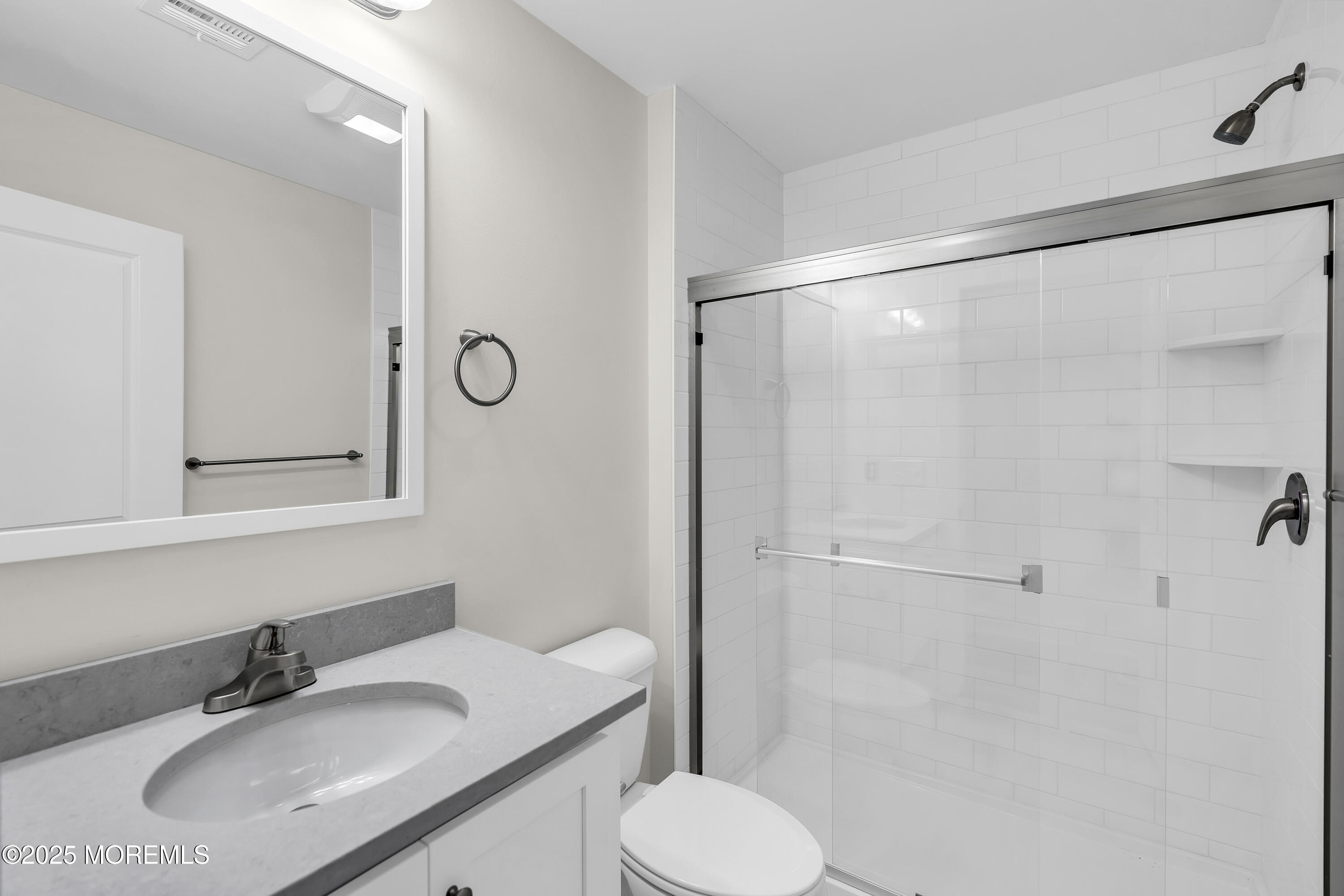 604 Ocean Road Point Pleasant, NJ 08742 - Photo 4 of 15 a bathroom with a sink toilet and shower