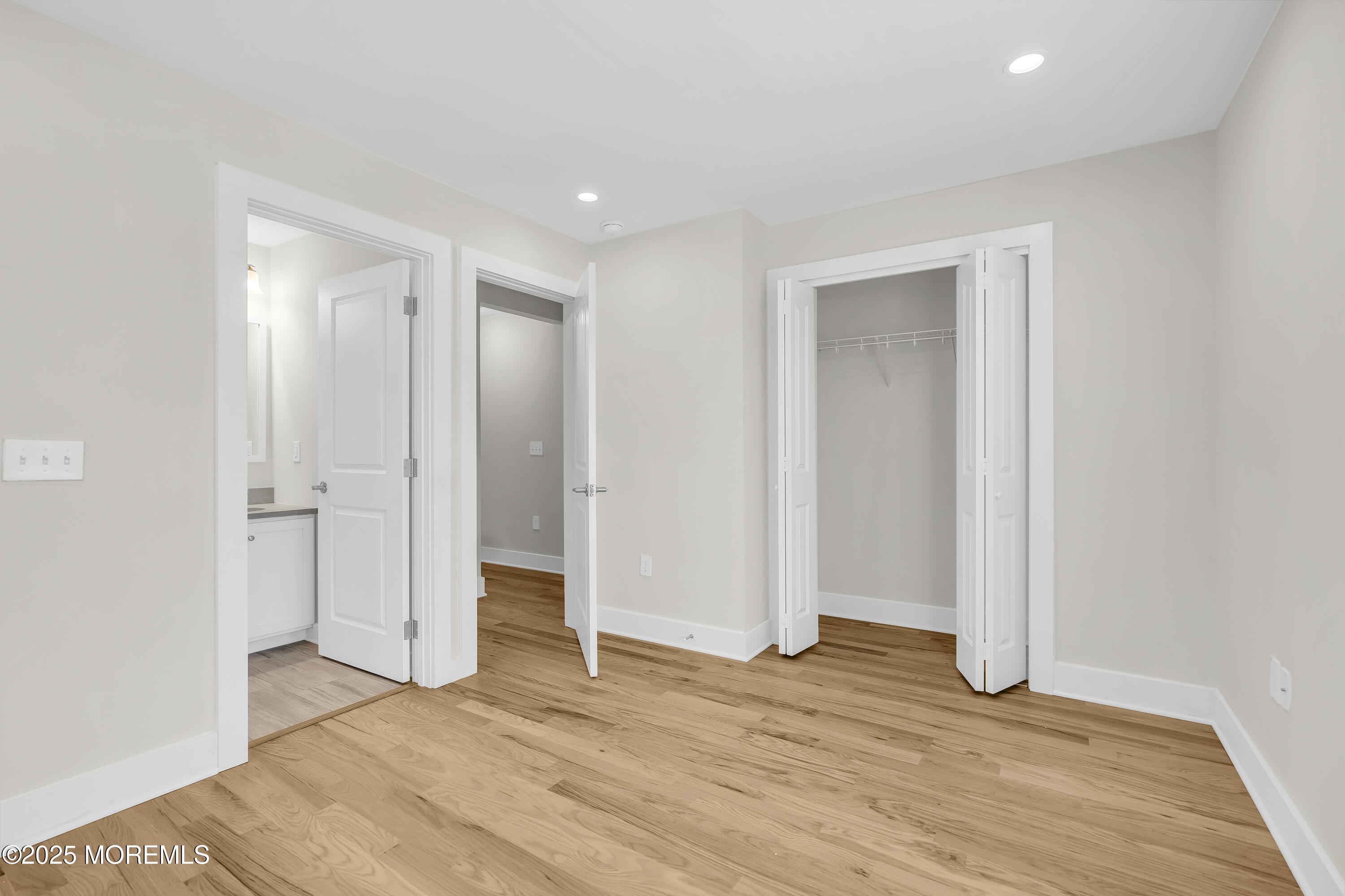 604 Ocean Road Point Pleasant, NJ 08742 - Photo 8 of 15 a view of an empty room with wooden floor and closet