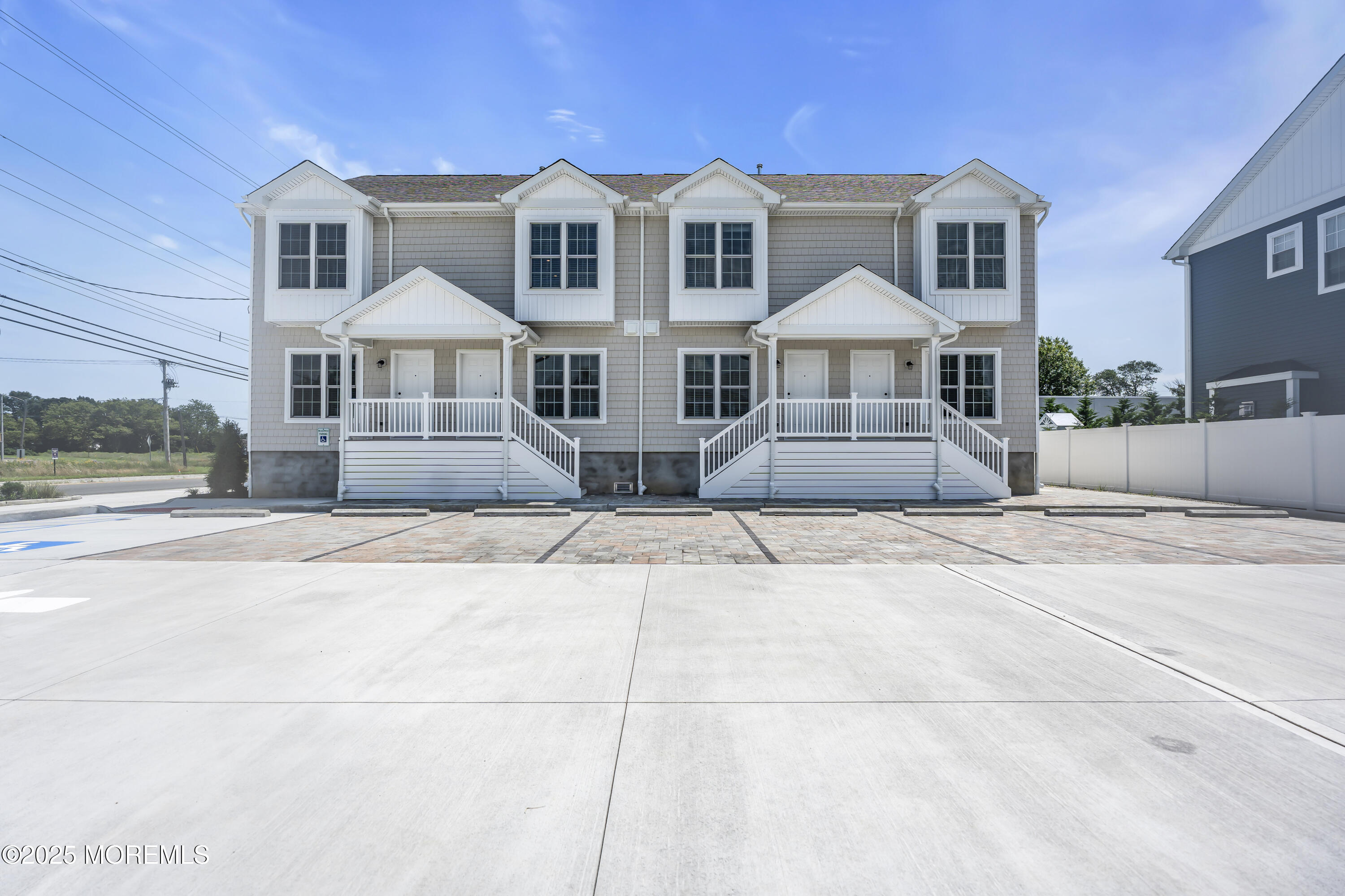 604 Ocean Road Point Pleasant, NJ 08742 - Photo 10 of 15 a front view of a house with a yard
