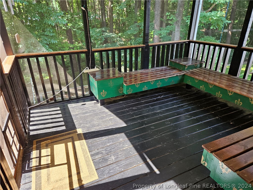 2825 Isabella Drive Raleigh, NC 27603 - Photo 11 of 31 a view of a wooden deck with a bench