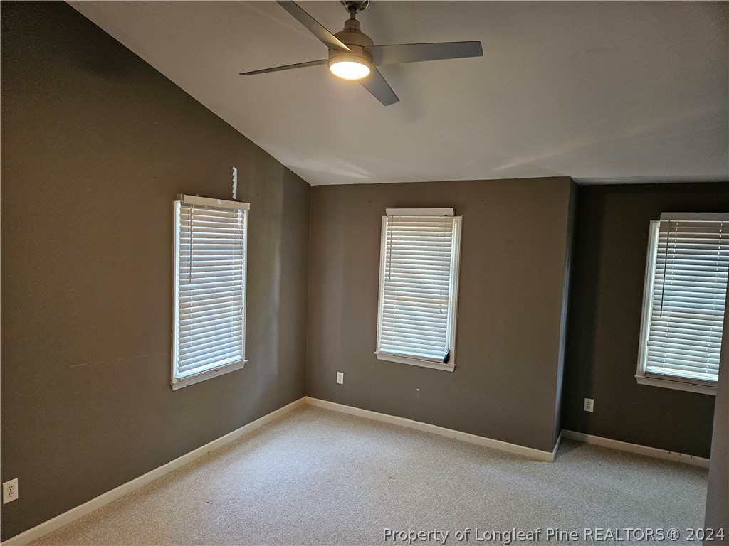 2825 Isabella Drive Raleigh, NC 27603 - Photo 19 of 31 a view of an empty room with a window