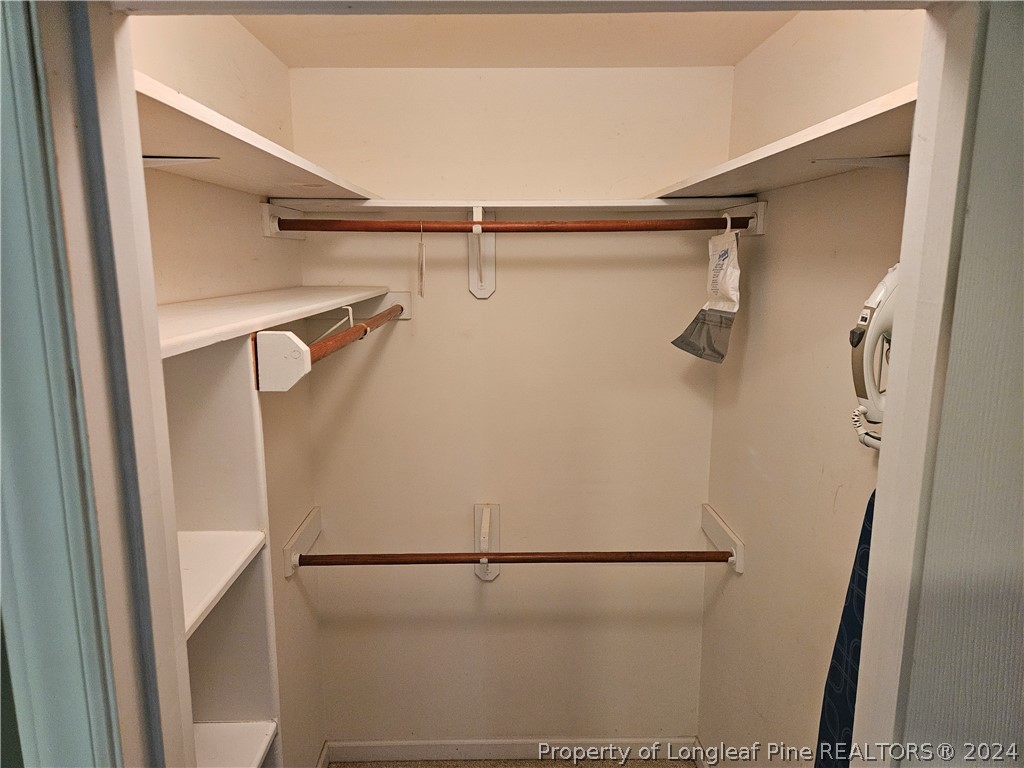 2825 Isabella Drive Raleigh, NC 27603 - Photo 22 of 31 a white refrigerator freezer and a stove sitting inside of a kitchen
