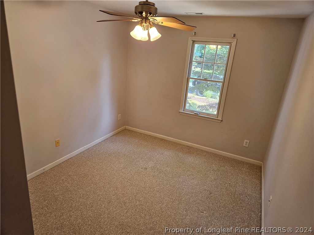 2825 Isabella Drive Raleigh, NC 27603 - Photo 25 of 31 an empty room with a window