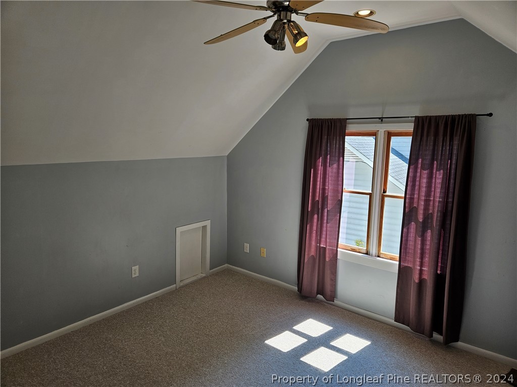 2825 Isabella Drive Raleigh, NC 27603 - Photo 28 of 31 an empty room with windows and closet