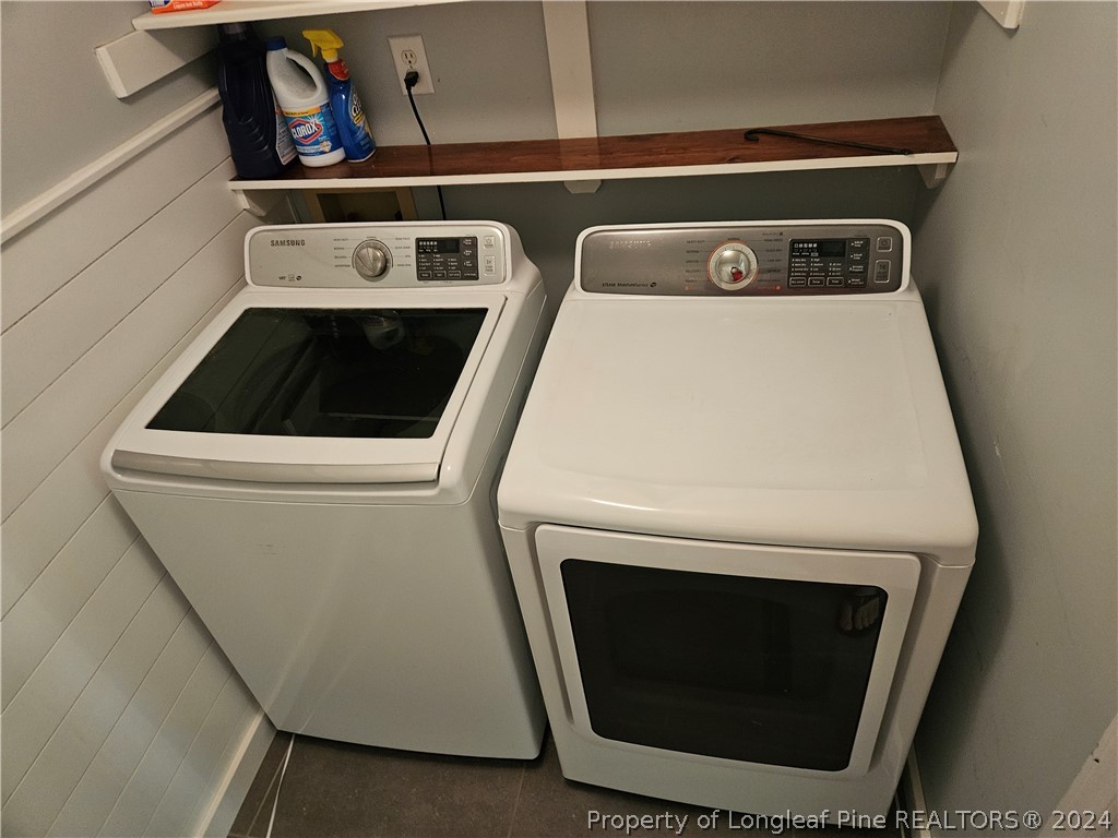 2825 Isabella Drive Raleigh, NC 27603 - Photo 30 of 31 a utility room with dryer and washer
