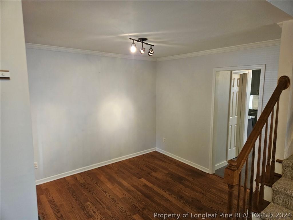 2825 Isabella Drive Raleigh, NC 27603 - Photo 3 of 31 a view of a hallway with a chandelier