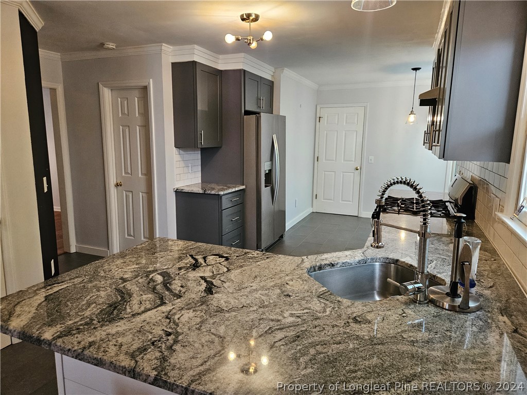 2825 Isabella Drive Raleigh, NC 27603 - Photo 7 of 31 a bathroom with a sink toilet and shower