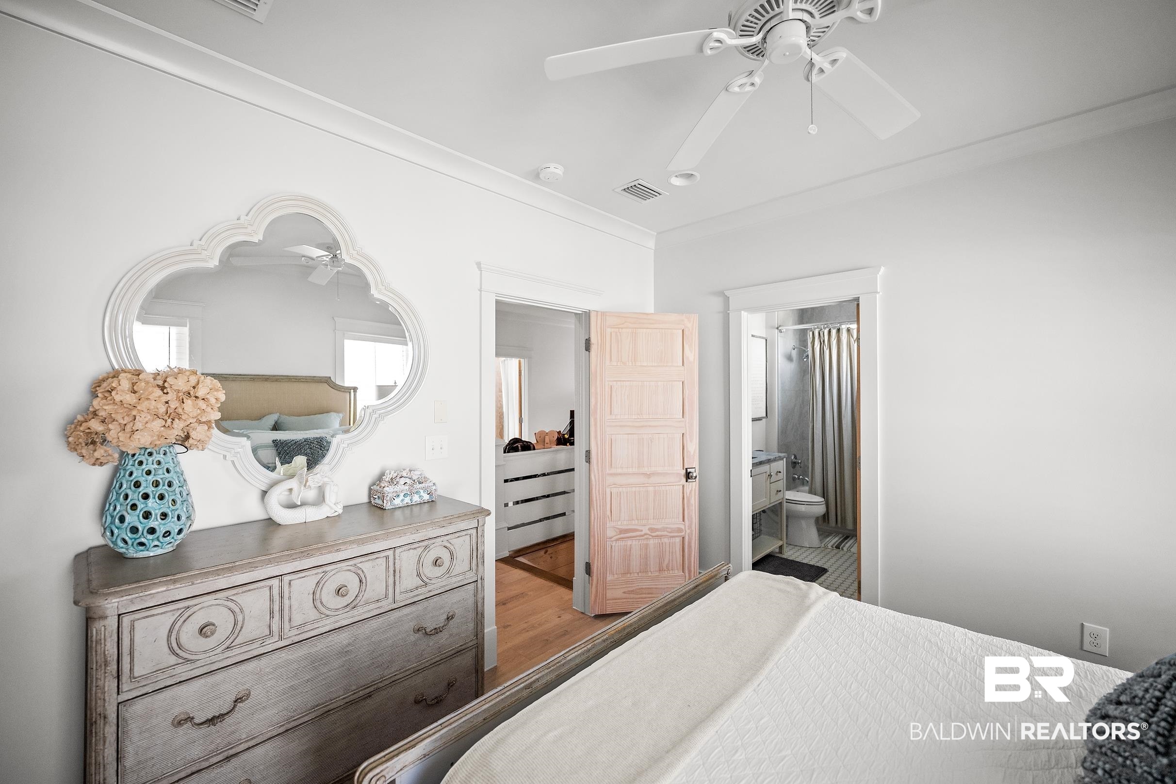 33186 Marlin Key Drive Orange Beach, AL 36561 - Photo 61 of 87 Bedroom with ornamental molding, light wood-style flooring, a ceiling fan, and ensuite bath