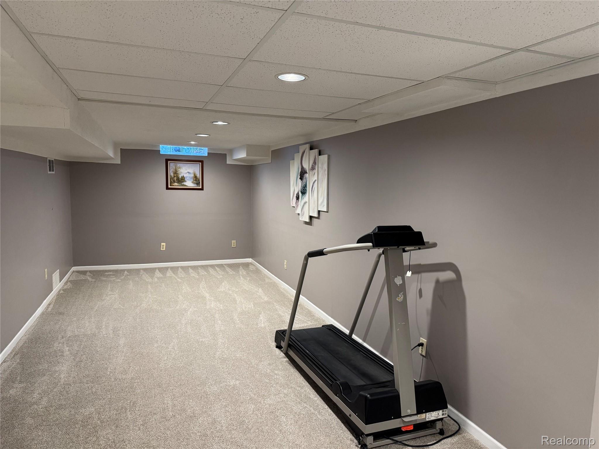 48583 Tilch Road Macomb, MI 48044 - Photo 44 of 53 Workout area featuring a drop ceiling, light carpet, and recessed lighting