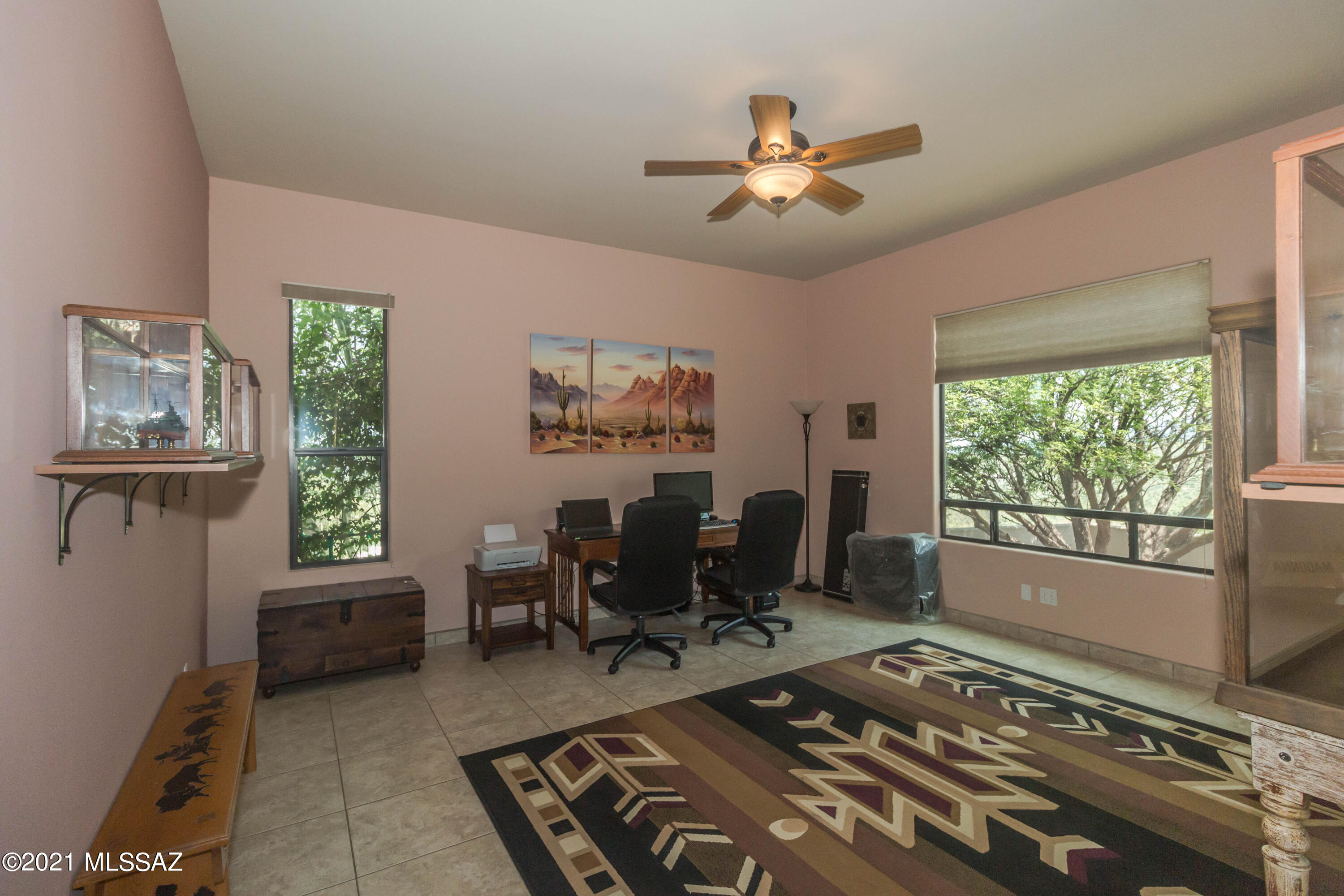 1567 Camino Esturion Rio Rico, AZ 85648 - Photo 21 of 41 a living room with furniture and a large window