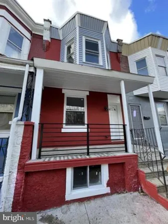 a front view of a multi story residential apartment building