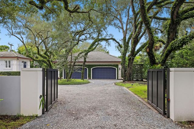 a living room with furniture window and wooden floor