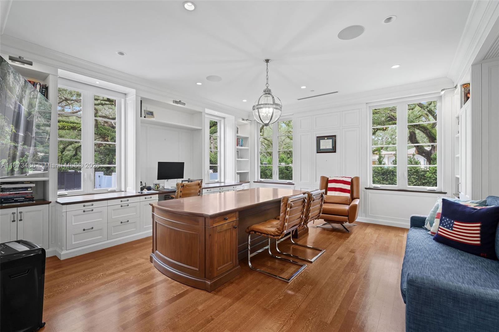 5400 Banyan Trail Coral Gables, FL 33156 - Photo 19 of 75 a view of a workspace with furniture and a window