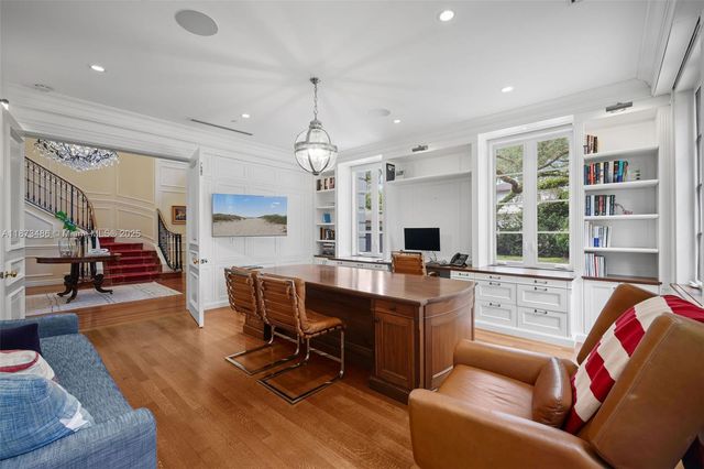 a spacious bedroom with a bed and a couch