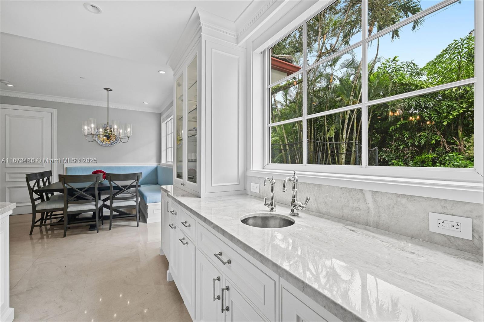 5400 Banyan Trail Coral Gables, FL 33156 - Photo 32 of 75 a spacious bathroom with sinks and a large mirror