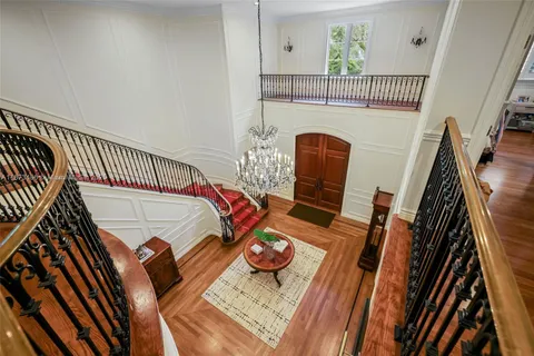 a view of a swimming pool with an outdoor space and seating area