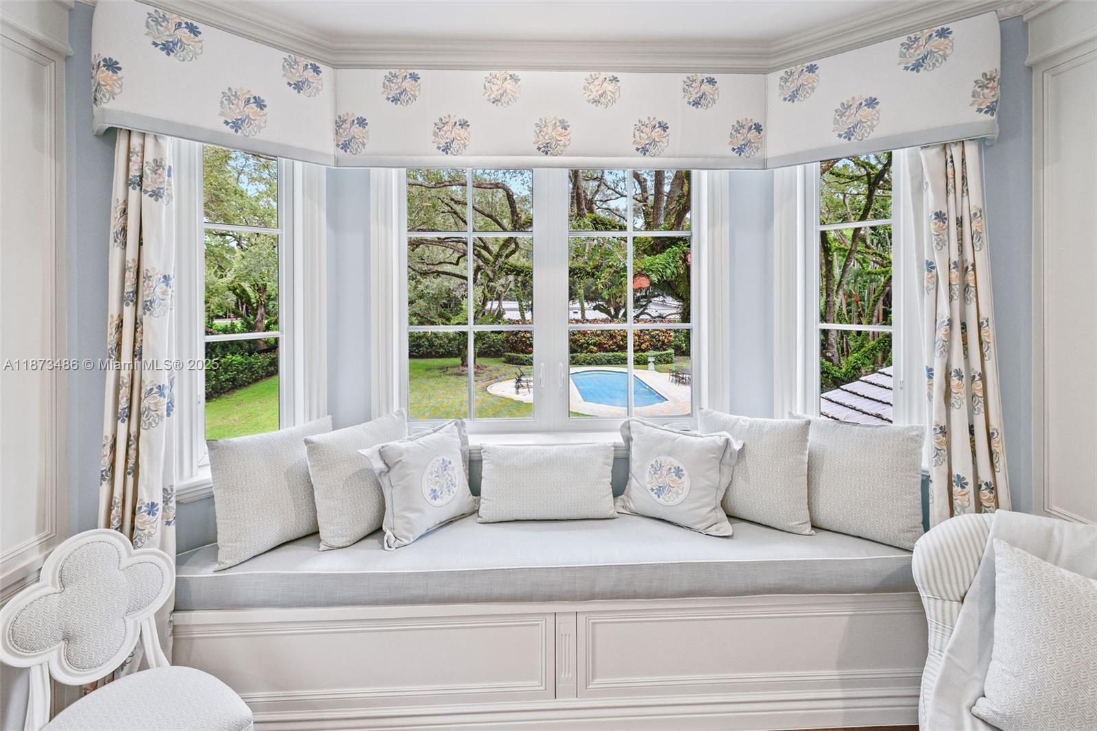 5400 Banyan Trail Coral Gables, FL 33156 - Photo 44 of 75 a living room with furniture and a large window