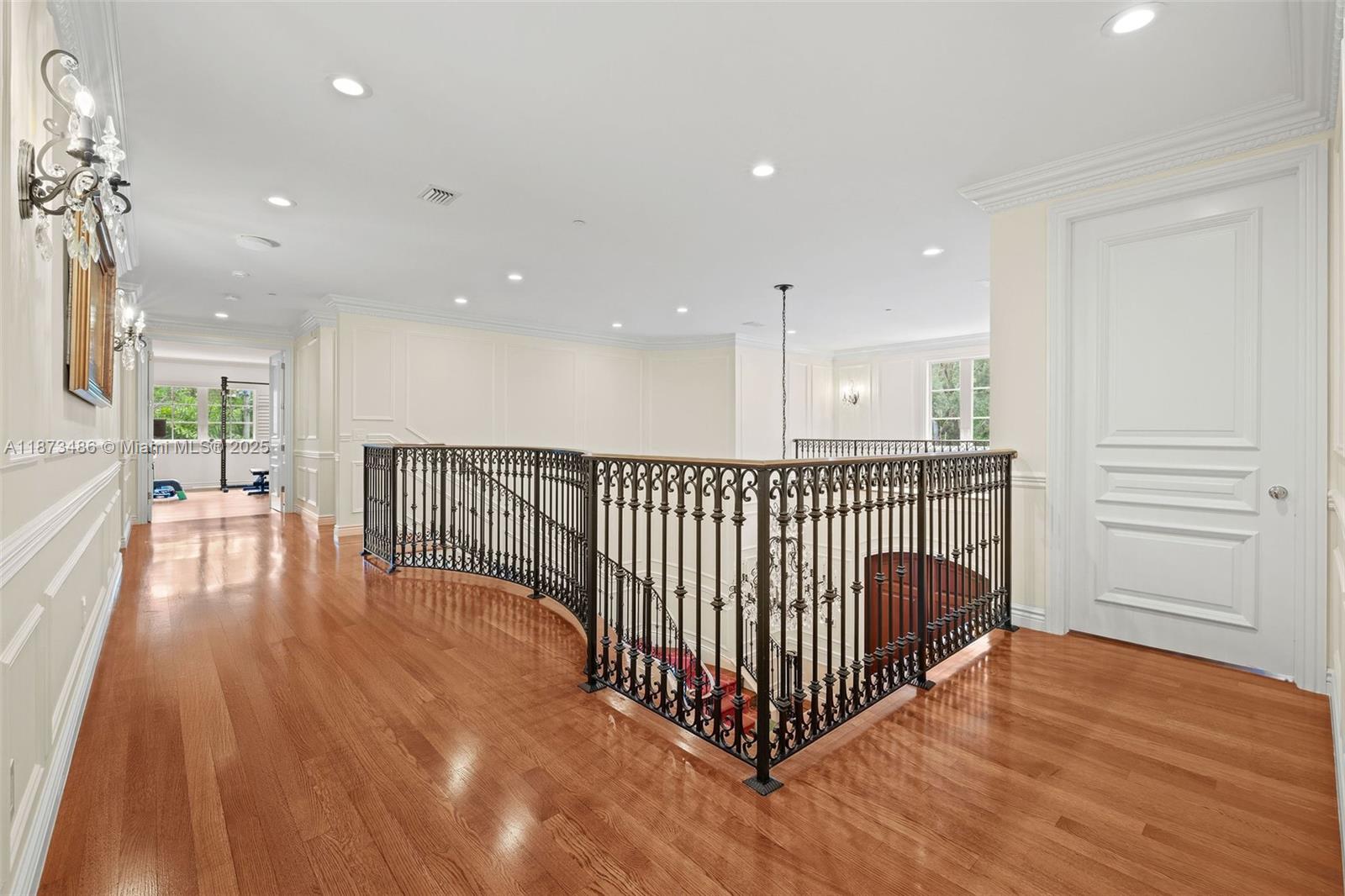 5400 Banyan Trail Coral Gables, FL 33156 - Photo 49 of 75 a view of a hallway with wooden floor