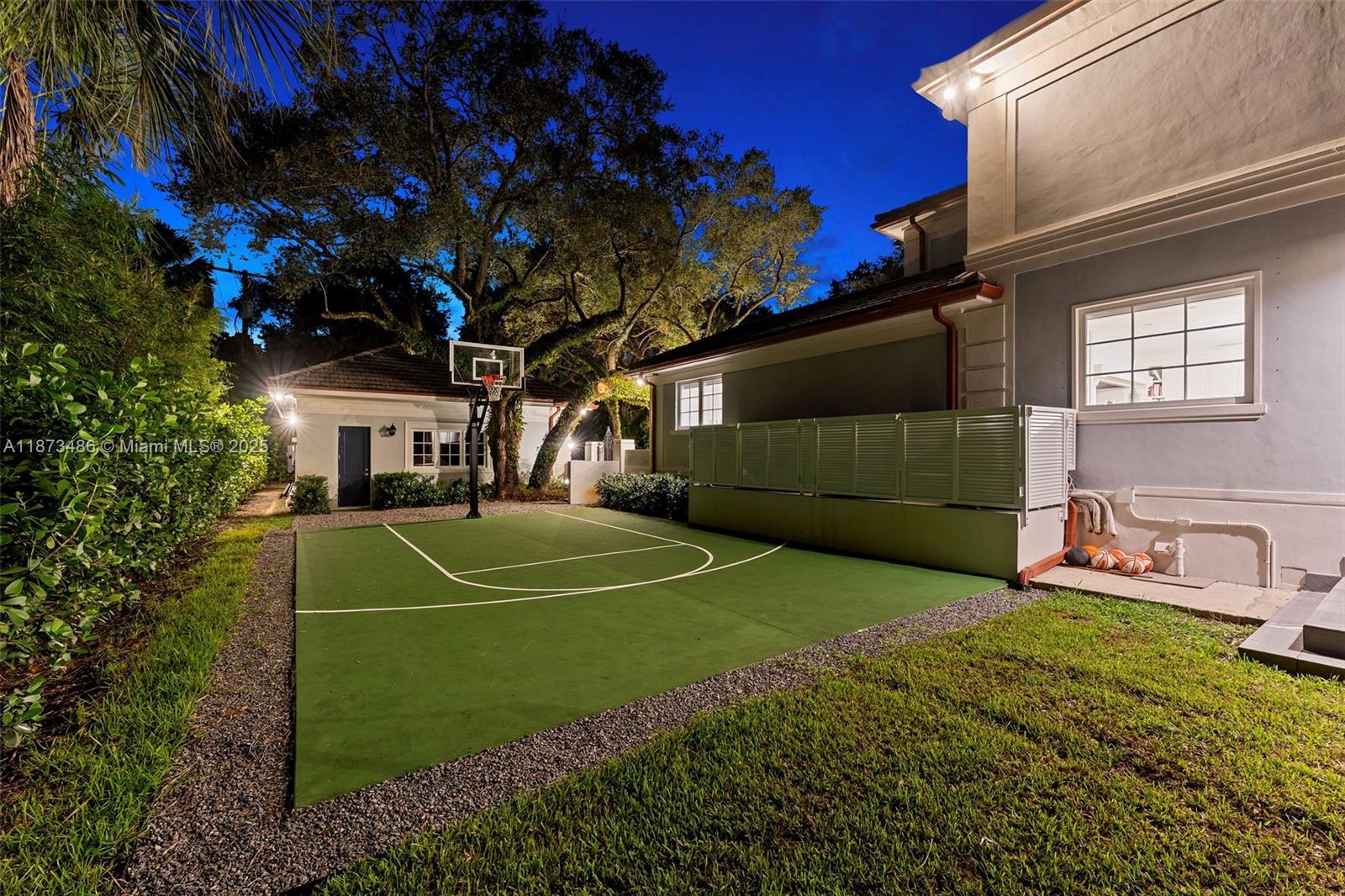 5400 Banyan Trail Coral Gables, FL 33156 - Photo 72 of 75 a view of a tennis court