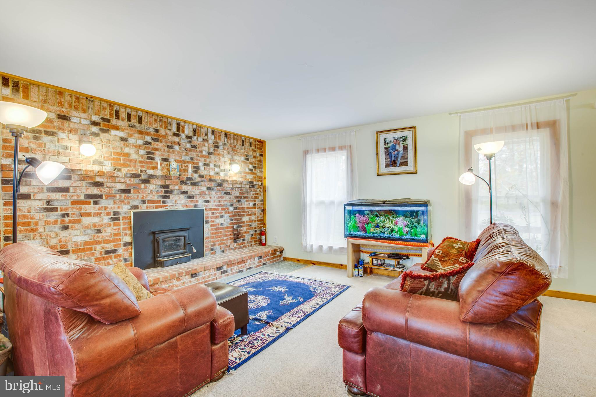 528 Cropp Road Fredericksburg, VA 22406 - Photo 3 of 20 Spacious family rom with impressive brick hearth