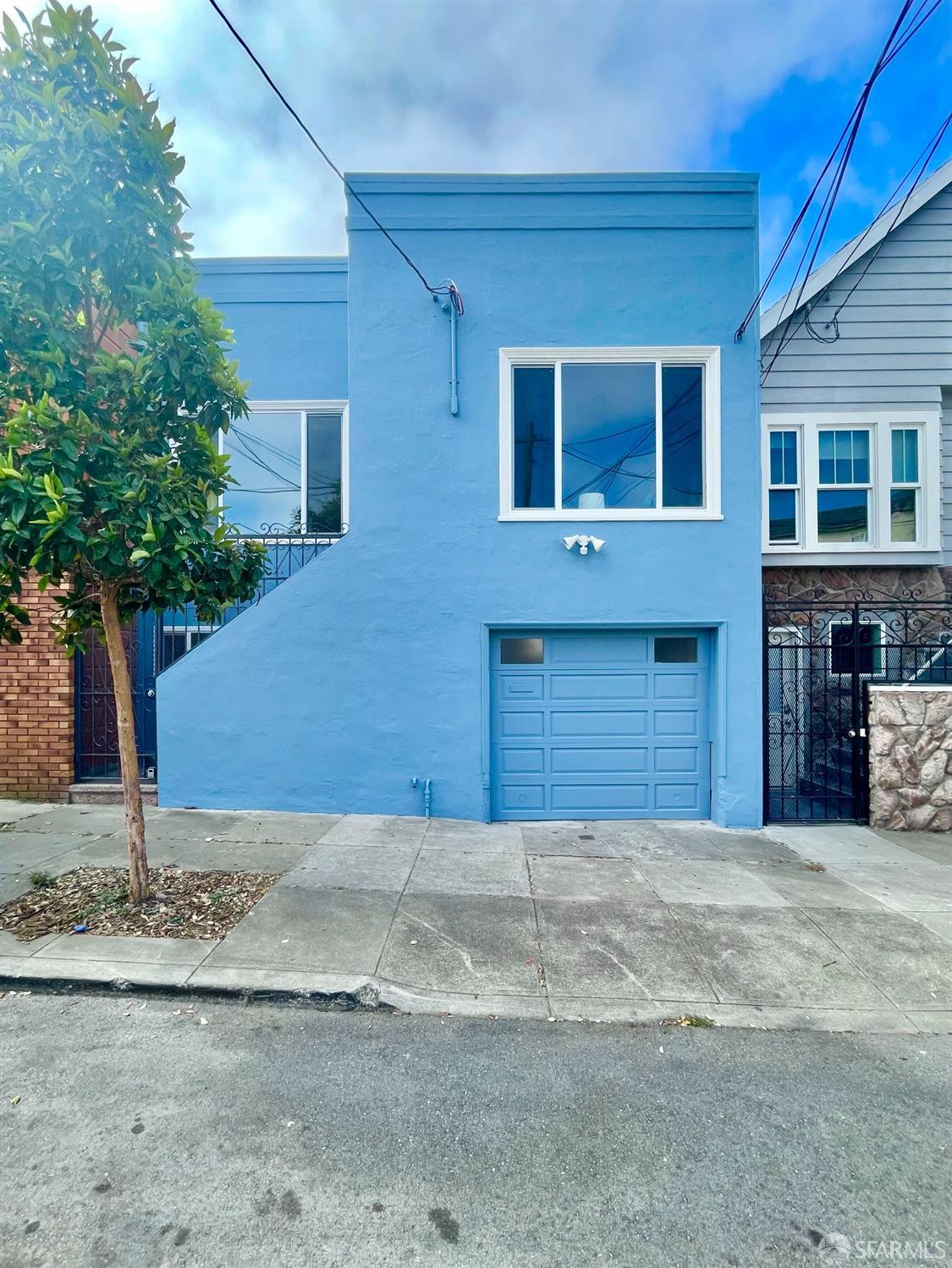 37 Ruth Street San Francisco, CA 94112 - Photo 1 of 26 a front view of a house with a yard