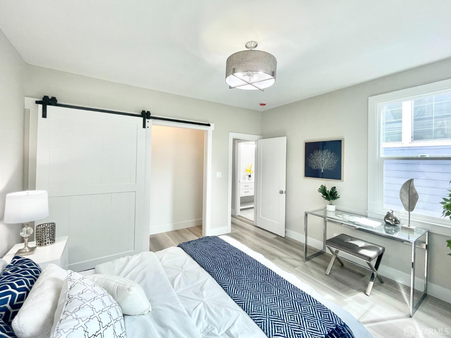 37 Ruth Street San Francisco, CA 94112 - Photo 15 of 26 a bedroom with a bed and a desk